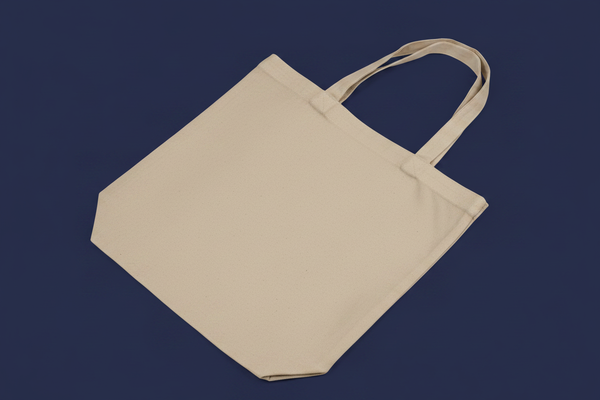 Canvas tote bag on navy blue background